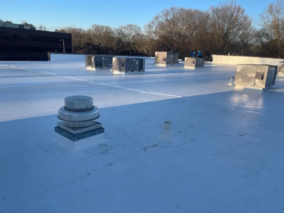 Finished 18,000+ sq ft TPO roof with rooftop HVAC units, from Premier Assets Portfolio's Google review